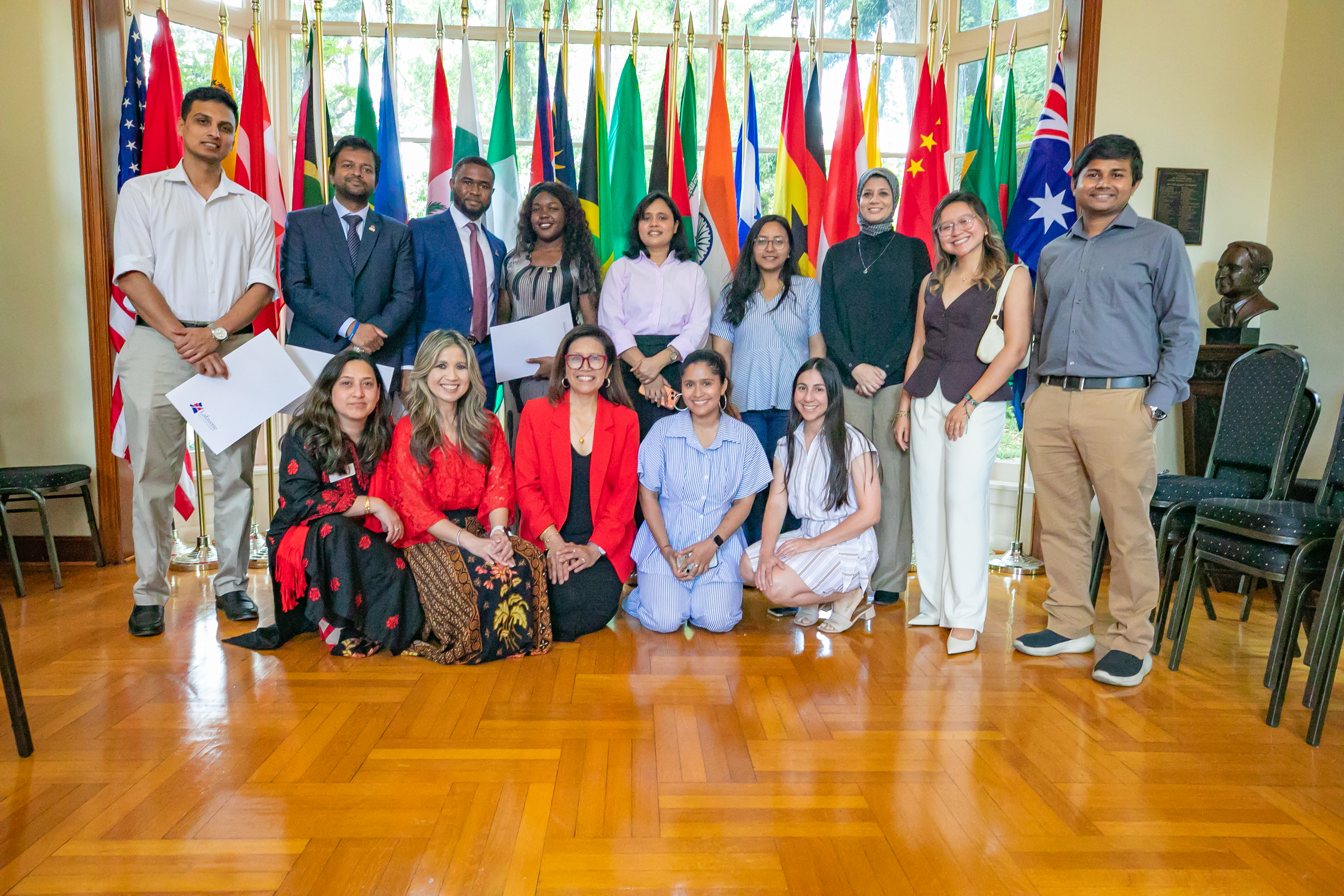 A group shot of international students who are leaving the university at the farewell gathering