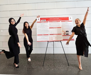 HSA online grad presents healthcare administration research project in UL Lafayette Student Union.