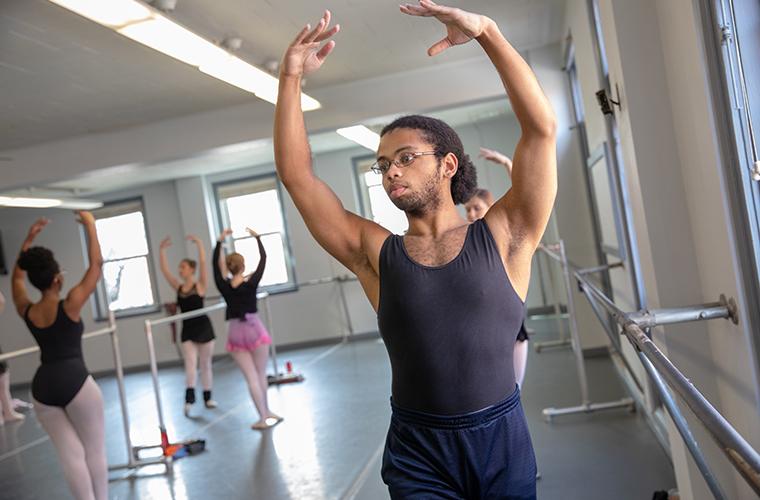 UL Lafayette dance students pose in ballet class