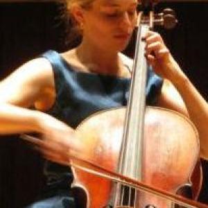 Portrait photo of Molly Goforth playing the cello